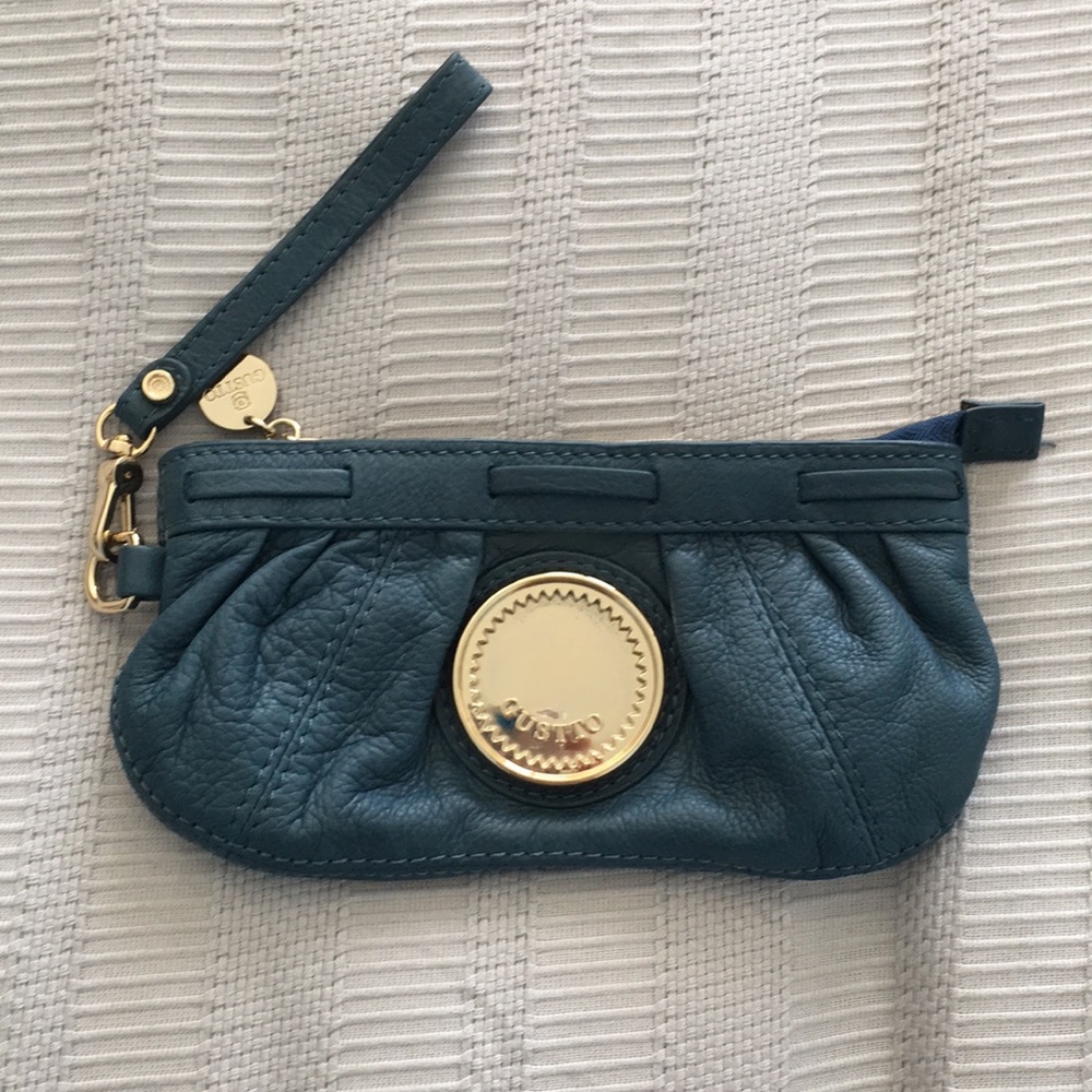 Small, blue Gustto clutch.